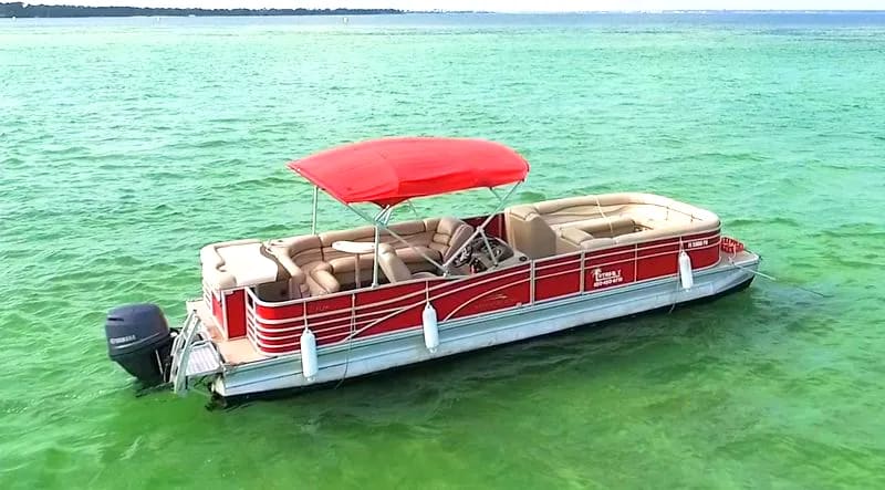 A red-topped 28ft pontoon boat, Luther's largest rental