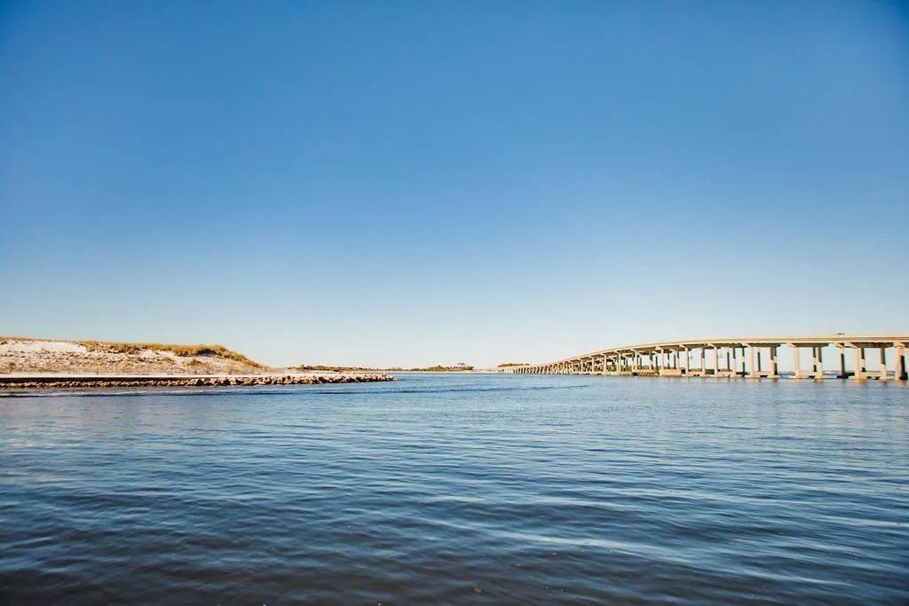 A bridge over the blue water near Destin Harbor