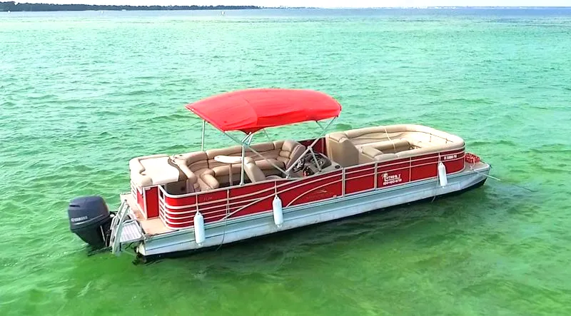 A red-topped 28ft pontoon boat, Luther's largest rental