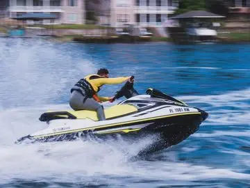 WaveRunner rider carving a turn on the water