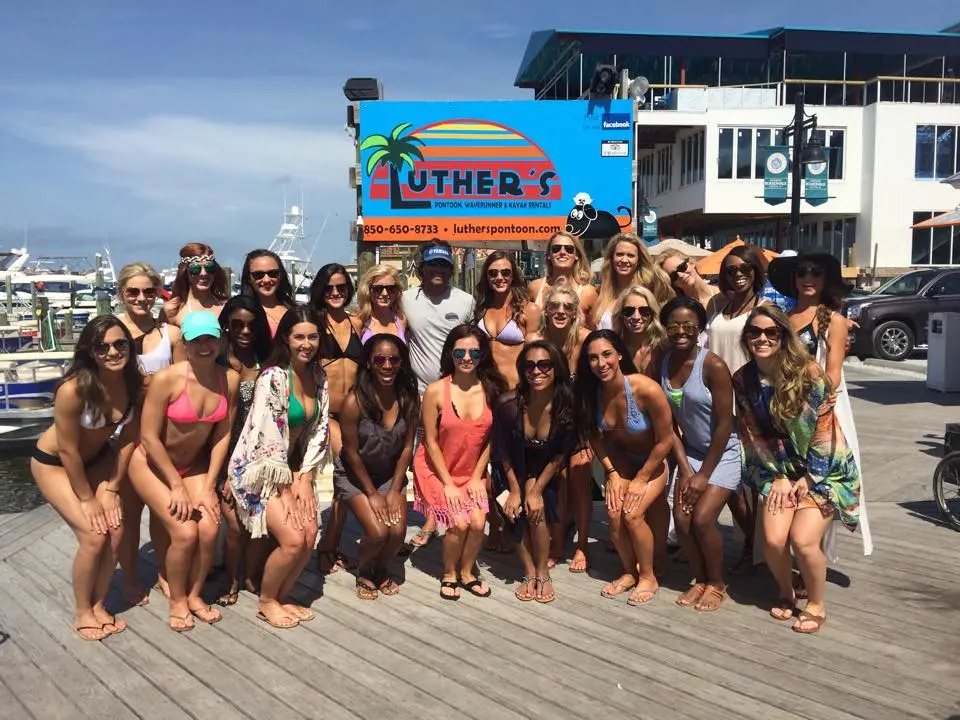 Friends gathered dockside ahead of a boat rental